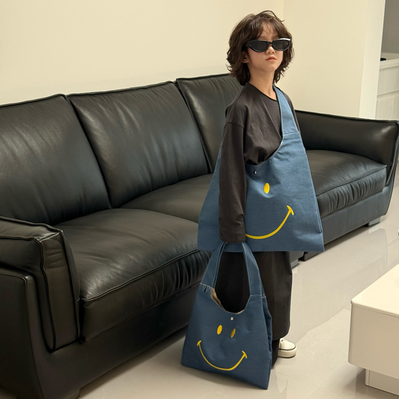 Versión coreana del popular bolso de hombro para niños y niñas, lindo y lindo bolso de mensajero para niños sonriente, estilo occidental, bolso para niños de gran capacidad