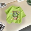 Green T-shirt, letter T
