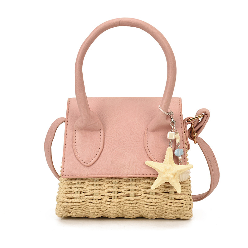 Mini bolso nuevo verano 2026 tela de paja de moda nicho sensación diaria bolso de hombro bolso de mochila
