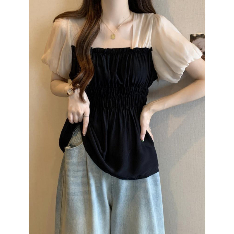 お腹を遮るシフォンの女性の夏の大きいサイズの太ったmmは腰を収めてやせているネットの糸の泡の袖の上着のフランスの方襟の小さいシャツを現します。|undefined