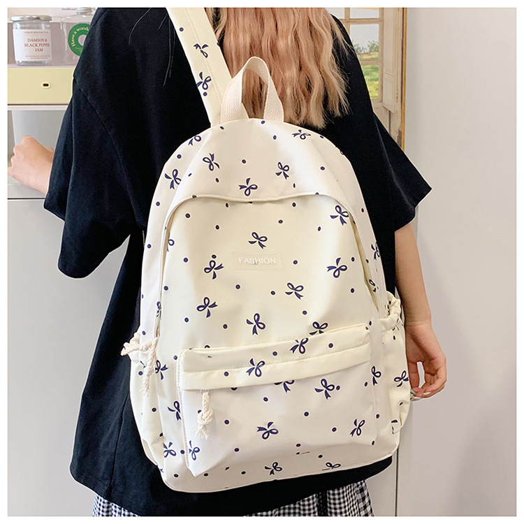 Japanese-style minimalist casual large-capacity backpack for middle and high school students, lightweight and trendy school daypack for girls