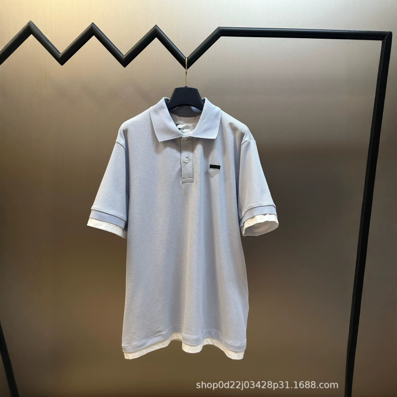 High-End Version of P Brand 26Ss Polo Shirt with Contrasting Fabric Triangle Logo, Loose Fit, Versatile and Stylish, Unisex Short-Sleeve Turn-Down Collar High-End Version of P Brand 26Ss Polo Shirt with Contrasting Fabric Triangle Logo, Loose Fit, Versatile and Stylish, Unisex Short-Sleeve Turn-Down Collar