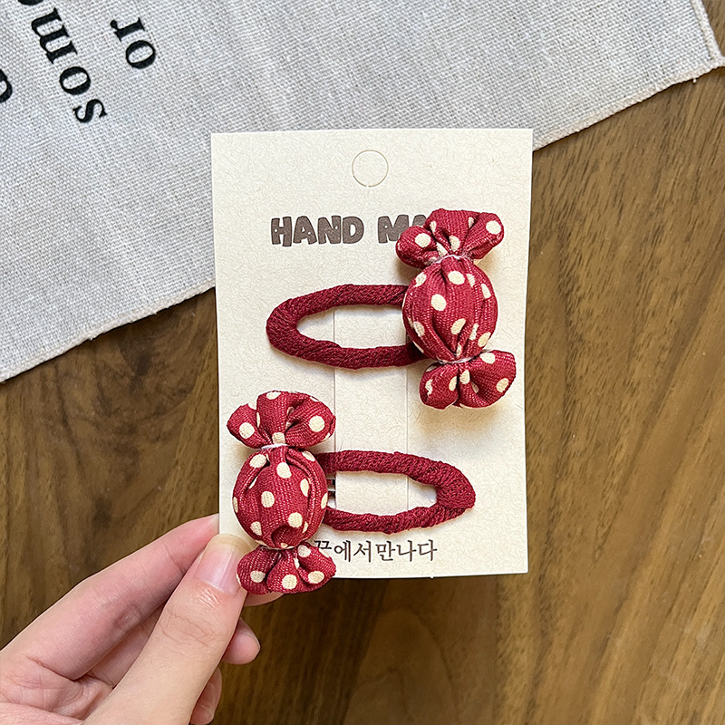 Nuevo estilo coreano dulce vino rojo tela ondulado punto estrella hueco clips BB para niños clips laterales cabello de niña universal
