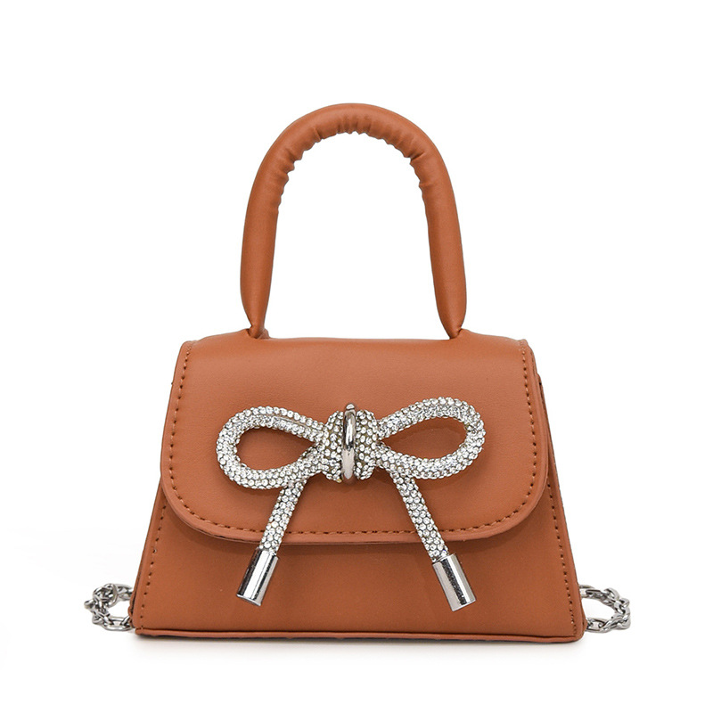 Ins niche French textured bag female 2024 new bow small square bag stylish shoulder messenger bag_voghion.com