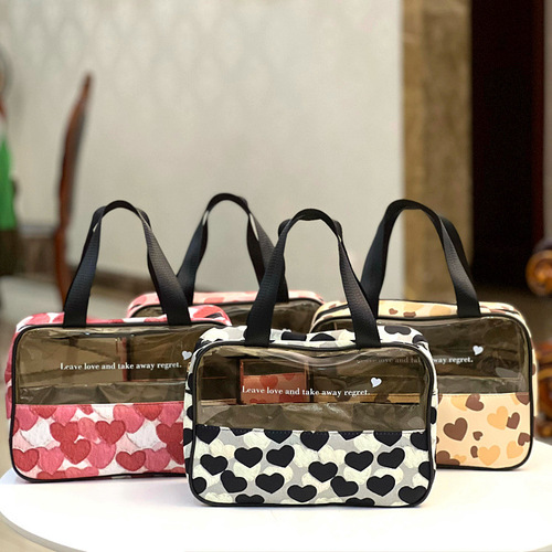 New Korean version of transplanted love translucent portable waterproof cosmetic bag, toiletry bag, portable cosmetic bag, hand bag for women