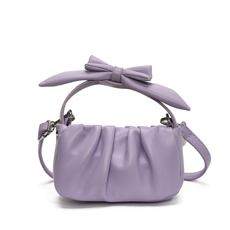 Versión coreana del bolso de nube de niña de color sólido simple estilo occidental pliegue lindo lazo bolso de bebé nuevo bolso para niños