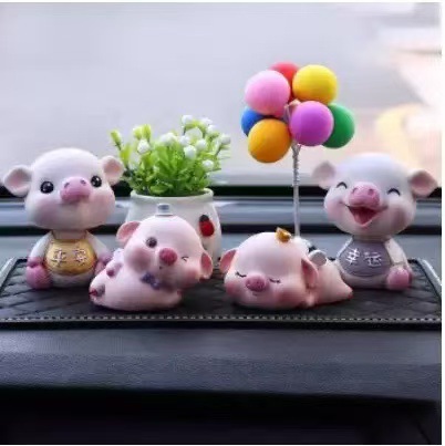 Car accessories and decorations: shaking head piggy, cute and creative high-end car interior decoration for goddesses