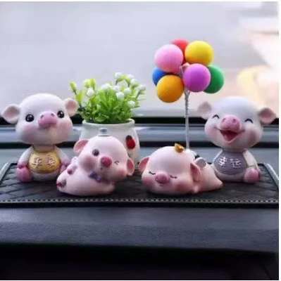 Car accessories and decorations: shaking head piggy, cute and creative high-end car interior decoration for goddesses
