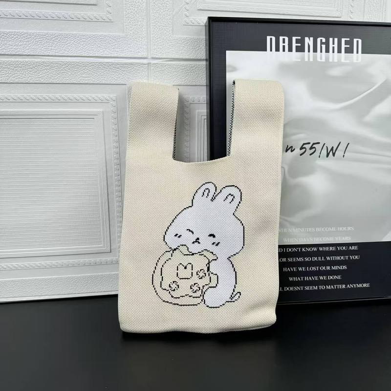 高級感のあるニットバッグの新型アニメの手首バッグの大容量のハンドバッグ|undefined