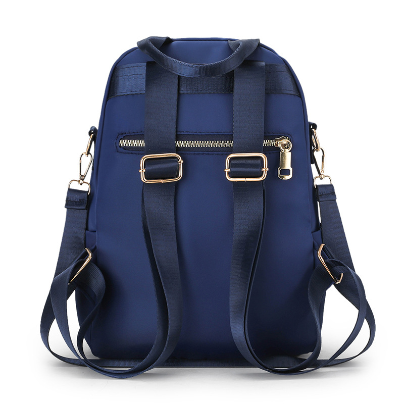 2022 nueva mochila de color sólido simple al aire libre portátil ocio mochila de mediana edad mochila de viaje al aire libre
