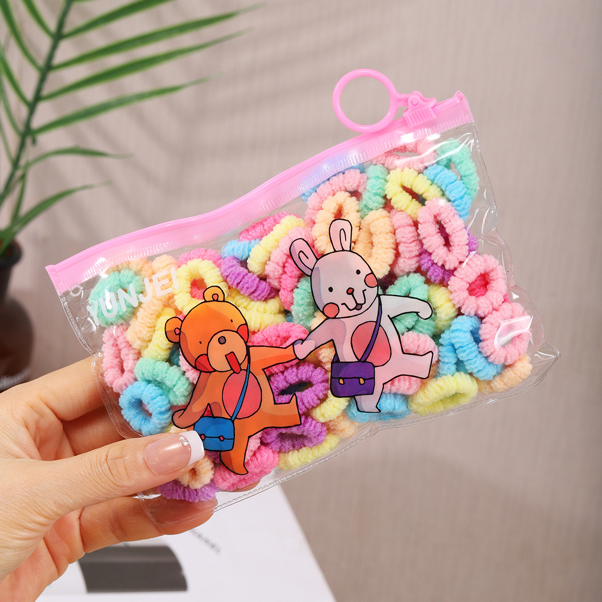 Anillo de toalla para niños fabricante color pulgar anillo de pelo no duele el pelo del bebé bolsa de cuerda de pelo tamaño pequeño banda de goma cuerda de pelo al por mayor