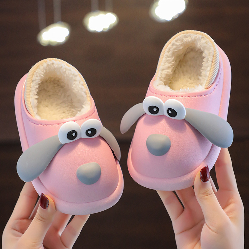 Zapatillas de algodón de invierno para niños dinosaurios de dibujos animados bebés lindos calentadores para niños y niñas con una base suave interior engrosada zapatos de algodón domésticos