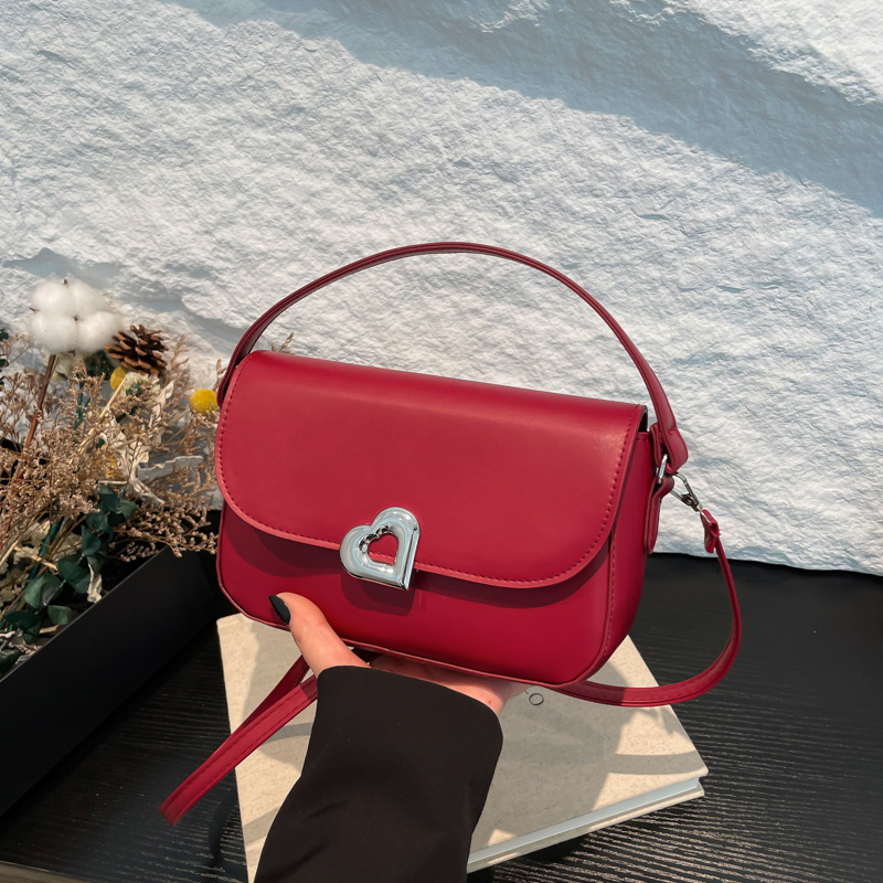 Texturas extranjeras bolsas de mano debajo de las axilas mujeres 2024 invierno nuevo estilo de moda bolsa de silla casuales bolsas de hombro