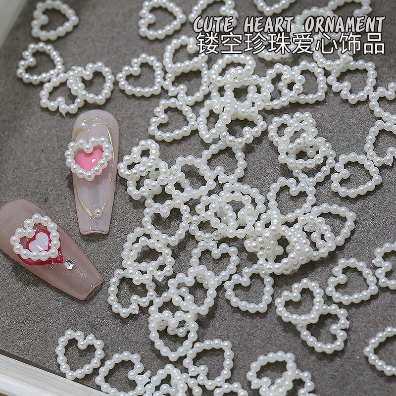 Net red hollow love pearl nail jewelry explosion white flat pearl Joker nail decoration accessories wholesale