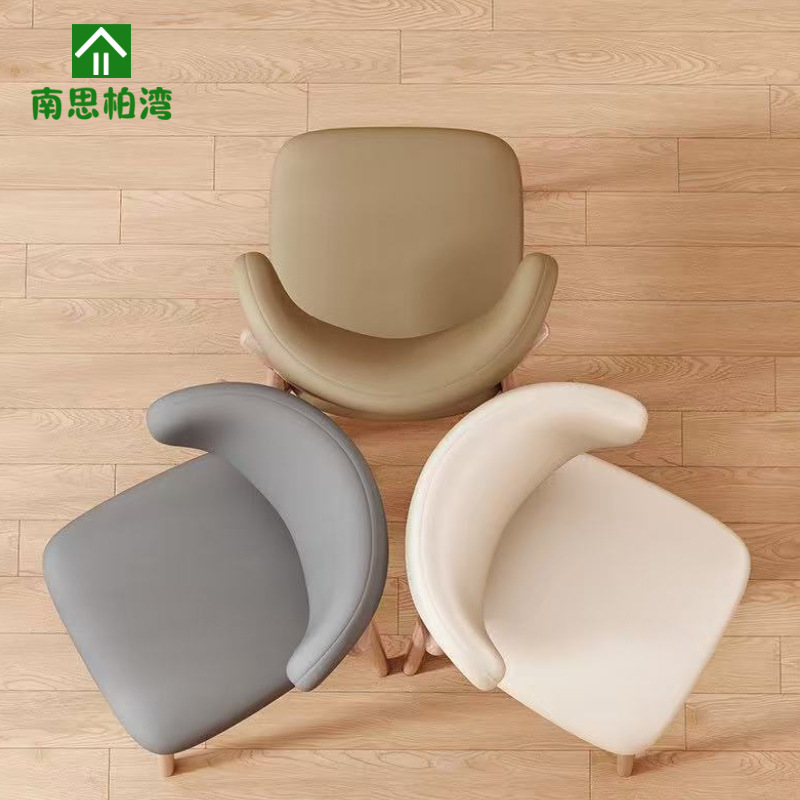 Sillas de negociación italianas sillas de cuero forjado modernas y simples sillas de recepción sillas de comedor con respaldo suave para el hogar y el comercio
