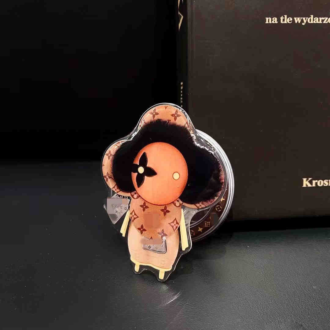 新型高級マグネットスタンドマグネット式携帯ケース通用太陽花マグネット式エアバッグスタンドはおしゃれで豪華です。