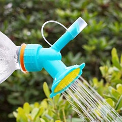 家庭用の花のスプレーヘッドはコーラの飲み物の瓶の両用の花のスプレーヘッドの太陽の花のスプレーヘッドで水の神器をやります。