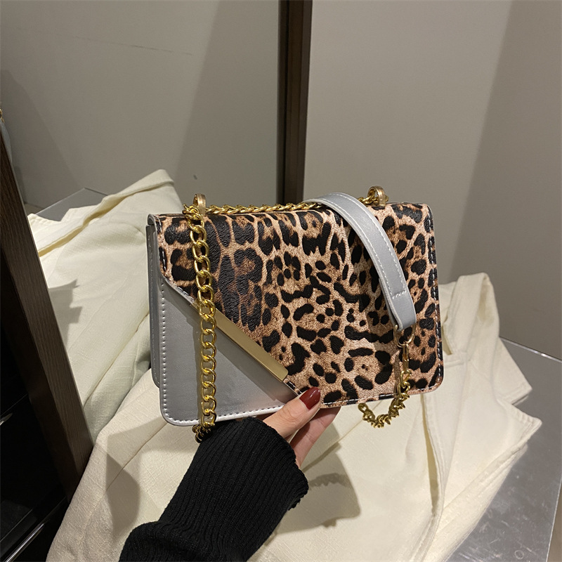 2024 invierno nuevo nicho diseño leopardo bolso de hombro de moda simple bolso de brazo cadenas mochila personalidad