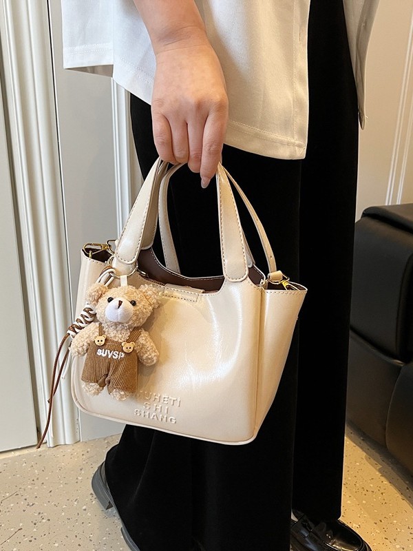 Vintage Maillard bolso de mano para mujeres 2025 nuevo estilo transfronterizo popular aceite cera cuero bolso de cubo textura mochila