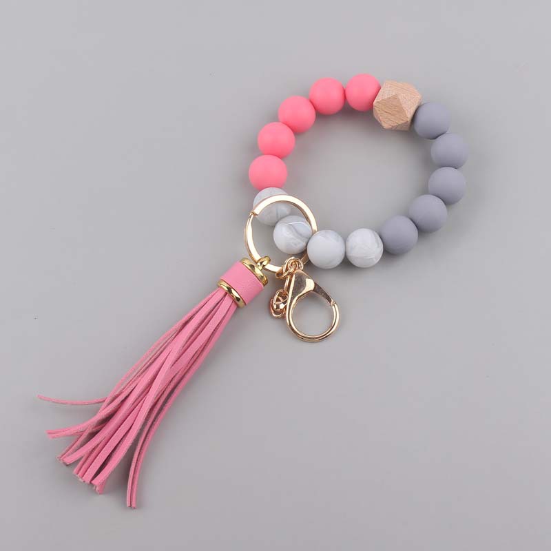 Nuevo cuero creativo pu borla colgante silicona muñeca llavero colgante silicona cuentas pulsera llavero