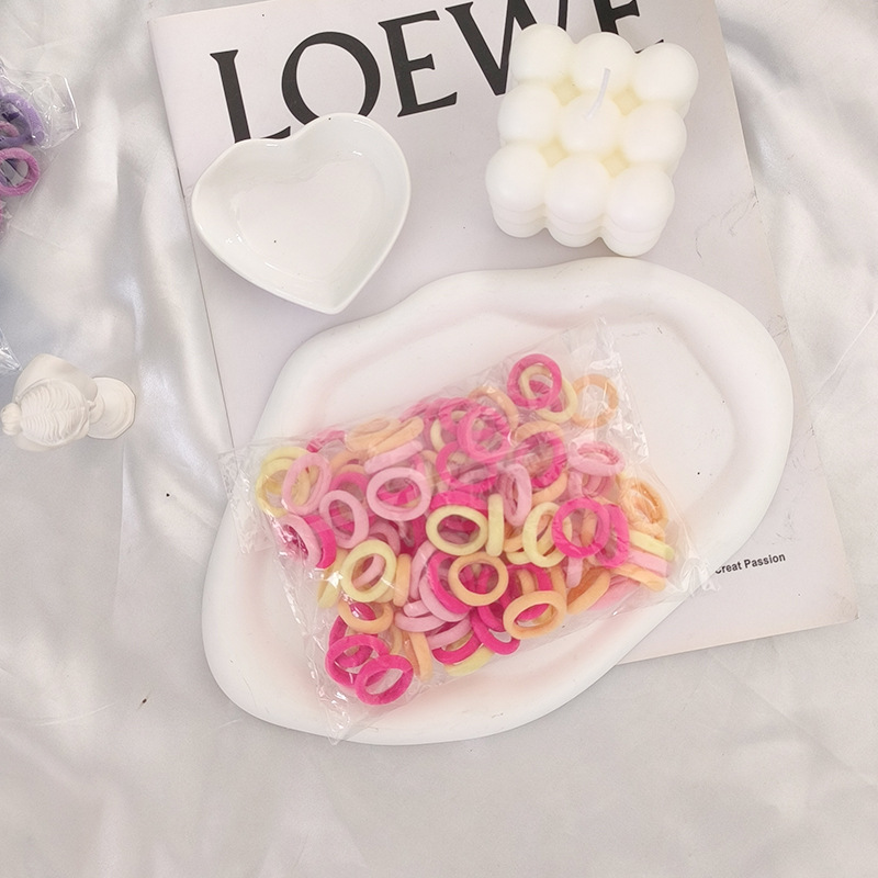 Solo al por mayor cuerda de pelo negro banda de pelo femenino estilo coreano alta elasticidad no duele el pelo banda de goma corbata alta Cola de Caballo accesorios para el cabello del bebé