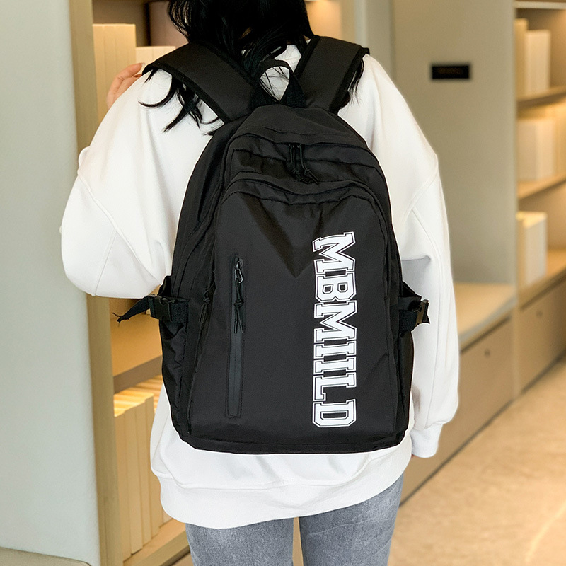 2024 nueva mochila japonesa simple de moda mochila de estudiantes de escuela secundaria gran capacidad mochila de viaje a prueba de rociadores