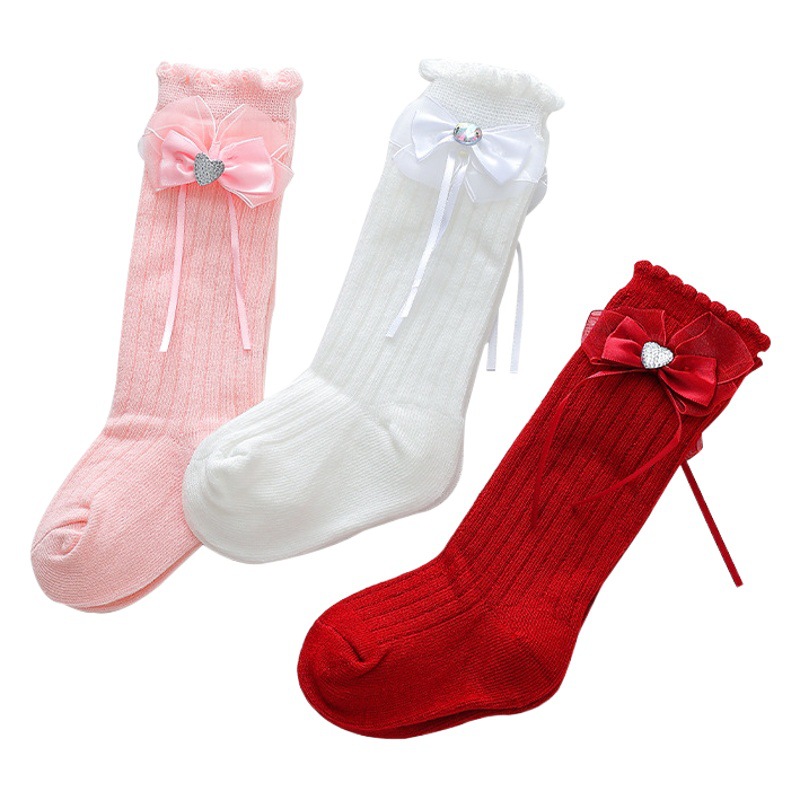 Calcetines de las niñas al por mayor de primavera y otoño calcetines de media pantorrilla de bebé niños de arco calcetines de princesa rojo brillante un mes de edad festivo