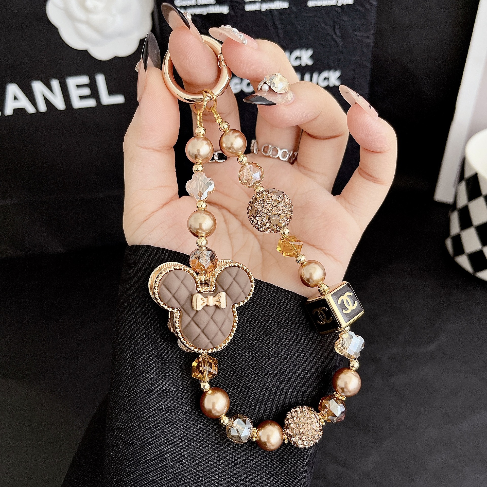 Hecha a mano y de alta calidad, colgante de teléfono móvil, pulsera de moda de micromecha, colgante de teléfono móvil corto.