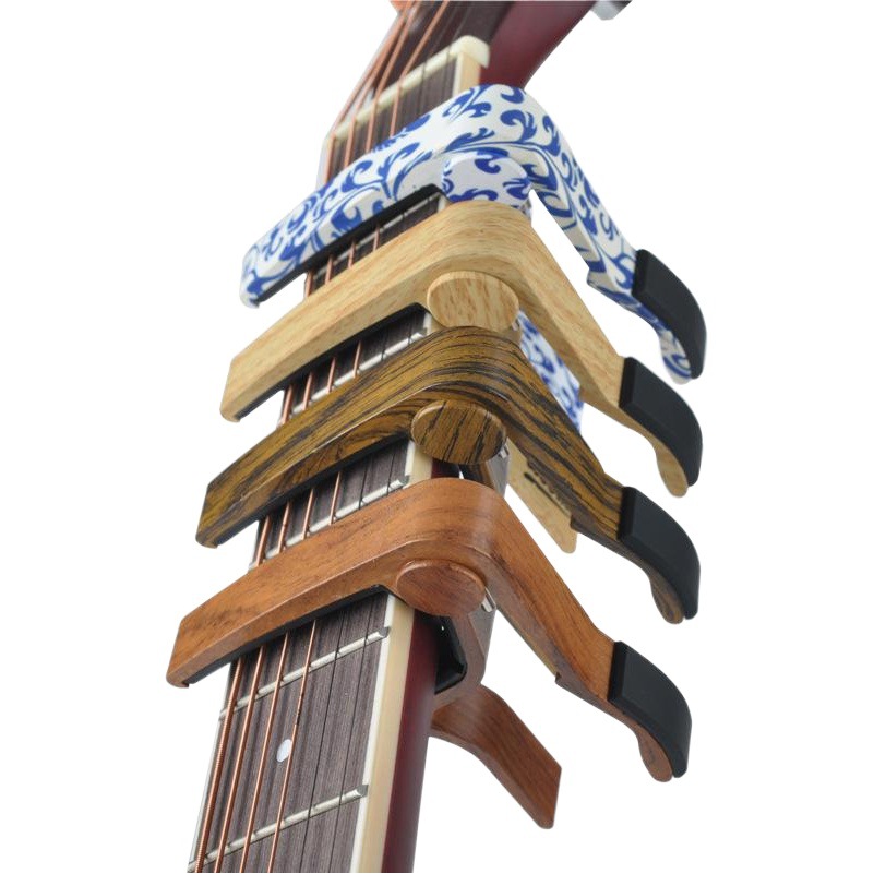 Amazon suministro Jidian guitarra popular capper guitarra de madera metal capper grano de madera capper fabricante