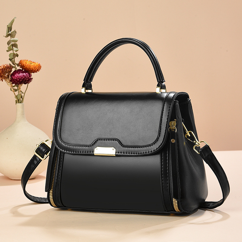 Bolso de mano bolso de comercio exterior de Taizhou bolso de mujer bolso de mensajero de un solo hombro de color sólido bolso de madre simple de moda de todo fósforo bags
