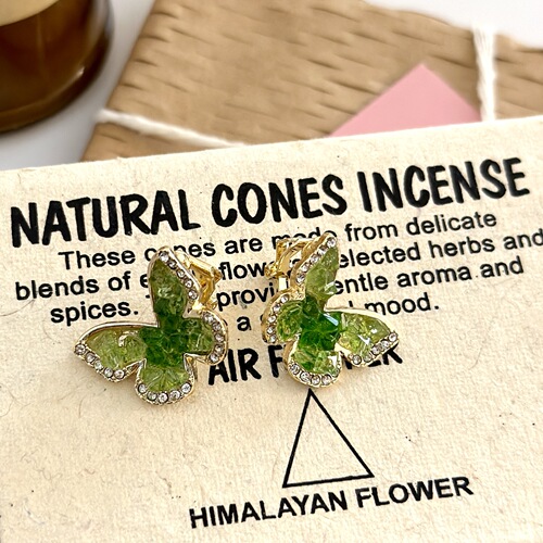Zhao Lusi's same style green crystal butterfly earrings niche design mosquito coil disc ear clip