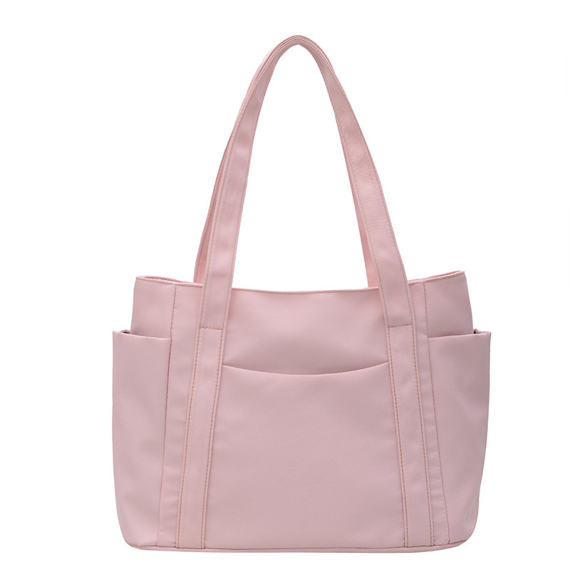 Bolso de gran capacidad para mujeres, nuevo estilo de moda, bolso de nylon, bolso de hombro casual, bolso de mano simple para mujeres.
