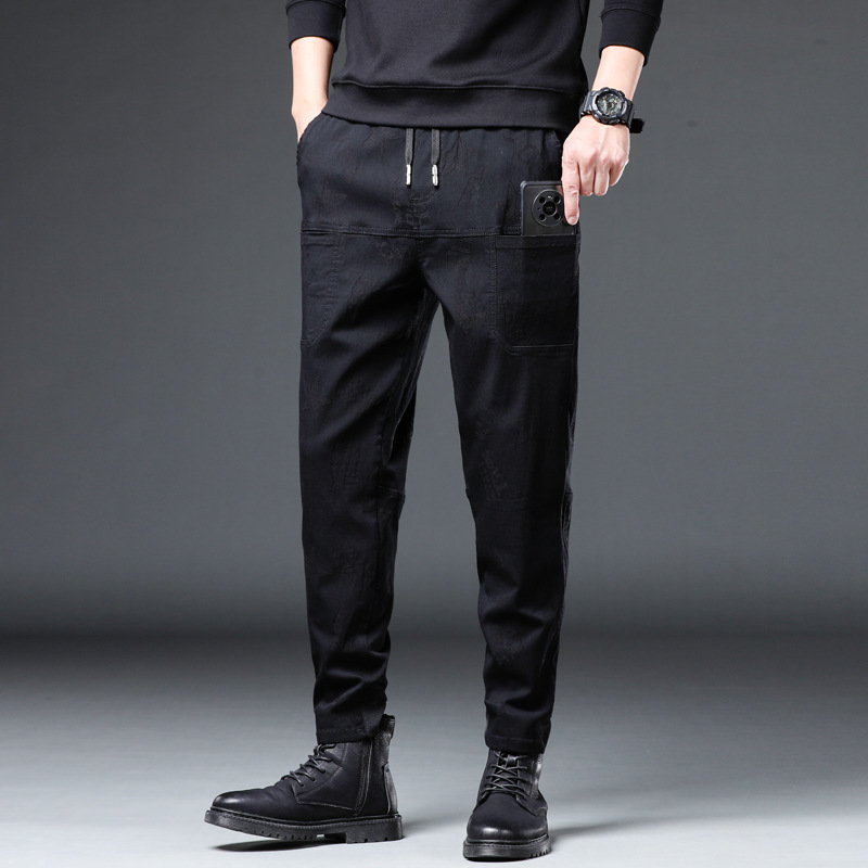 2022 primavera y verano nuevos pantalones casuales de los hombres de seis bolsillos jacquard estiramiento pantalones de mezclilla de camuflaje de los hombres monos de moda