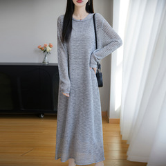 春夏の新作フレンチルーズレイヤード中空ロングセーター女性の長袖フード付きドレス