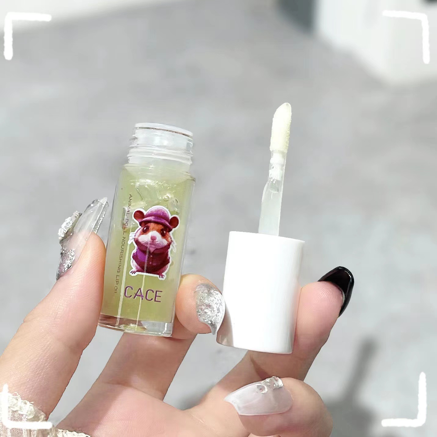 CACE Animal Doll Lip Oil Moisturizes and hydrates, nourishing lip lotion protects lips, reduces lip lines, and makes lips plump. Cross-border wholesale undefined