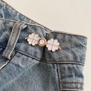 Pantalones de jeans de cintura, botones de cintura ajustados, botones ajustables fijos