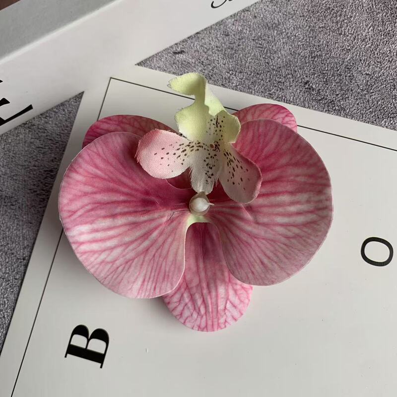 絹布の胡蝶蘭の花の頭は花の壁の部品の花の材料の頭をシミュレーションして髪を飾ってdiyの手作りの結婚祝いの贈り物を挟んで造花を飾ります。|undefined