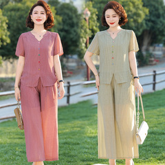 中年のお母さんの夏服の国風のスーツ2025新型の洋気の中で老年の婦人服のファッションは年齢を減らしてゆったりしています。