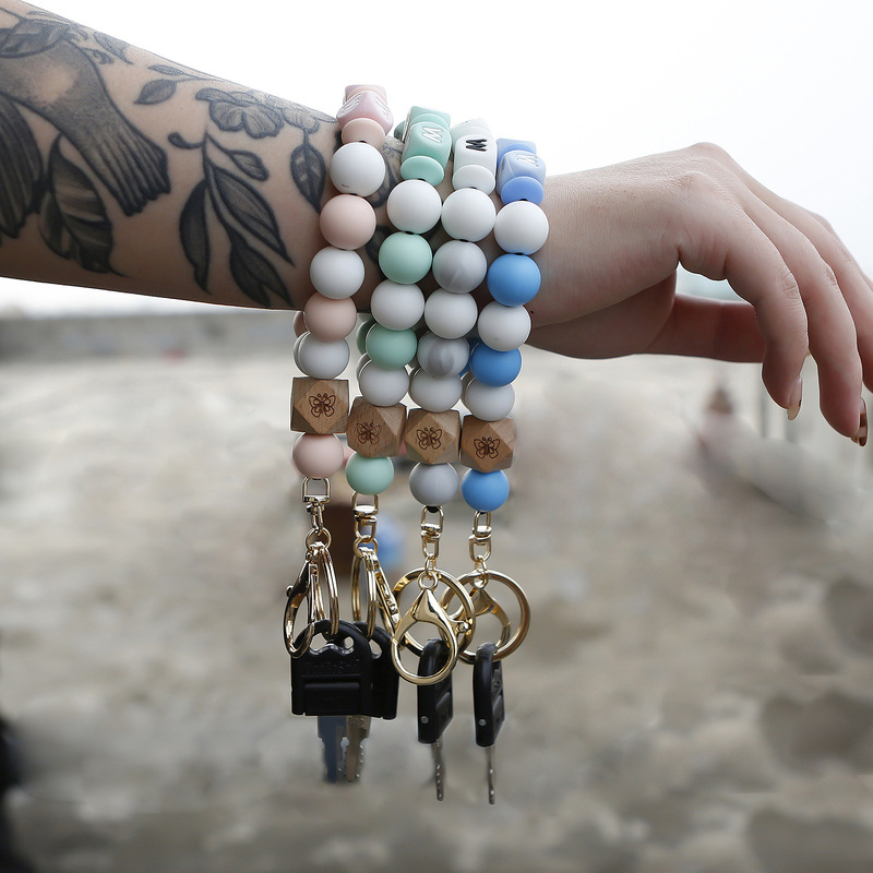 MAMA silicone bracelet keychain Amazon cross-border butterfly wooden beads beaded bracelet keychain pendant wholesale