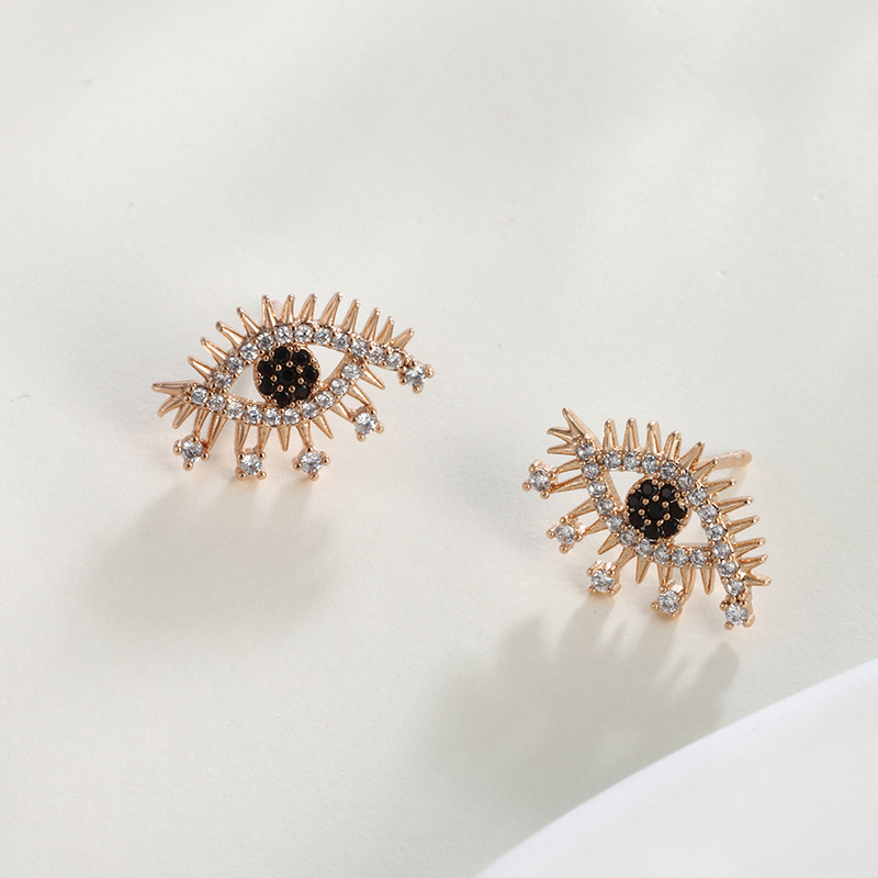 Xuping Europa y los Estados Unidos de la nueva moda extraña pendientes de ojos de diamantes, pendientes de orejas de lujo ligero y de alto nivel, pernos de ojos del diablo