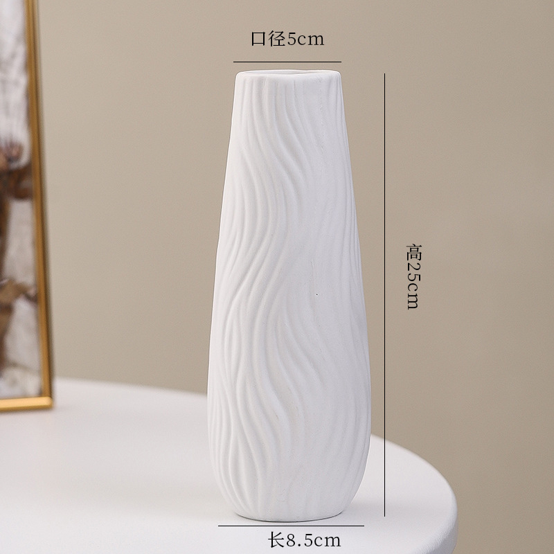 シンプルな現代の満天星陶磁器の花瓶の置物の客間の白い磁器の小さい清新な乾いた花の生け花の創意の陶磁器の花器|undefined