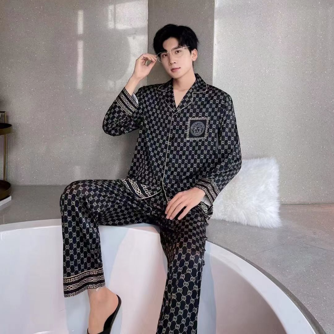 2023 primavera y otoño nueva pareja pijamas de seda de hielo de las mujeres de manga larga estilo europeo y americano de los hombres al aire libre desgaste del hogar