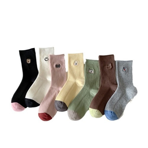 25 spring and summer socks women's middle tube boneless imitation double needle Korean embroidery pile socks internet celebrity cartoon smiling face long tube luck
