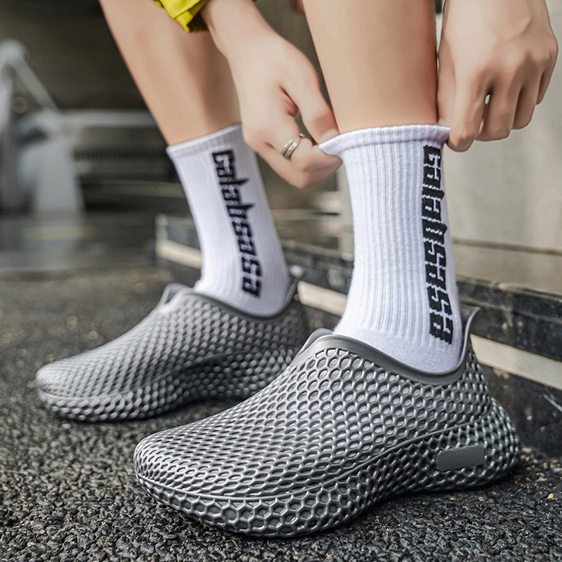 Cross-border 2026 nuevo verano al aire libre integrado sandalias de explosión deportivo transpirable zapatos de playa antideslizantes zapatos de agujero para hombre