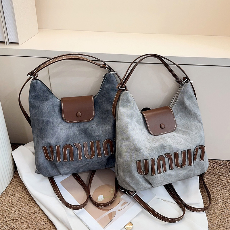 2026 nuevo bolso de alto valor facial bolso de clase para estudiantes universitarios bolso de hombro de nicho para mujeres gran capacidad coreana