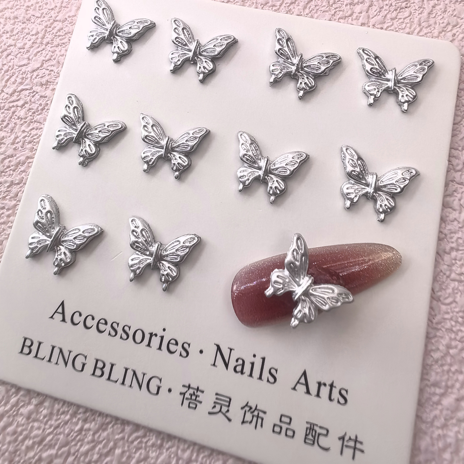 大量现货银色蝴蝶美甲饰品轻奢立体蝴蝶结金属大蝴蝶翅膀指甲钻饰