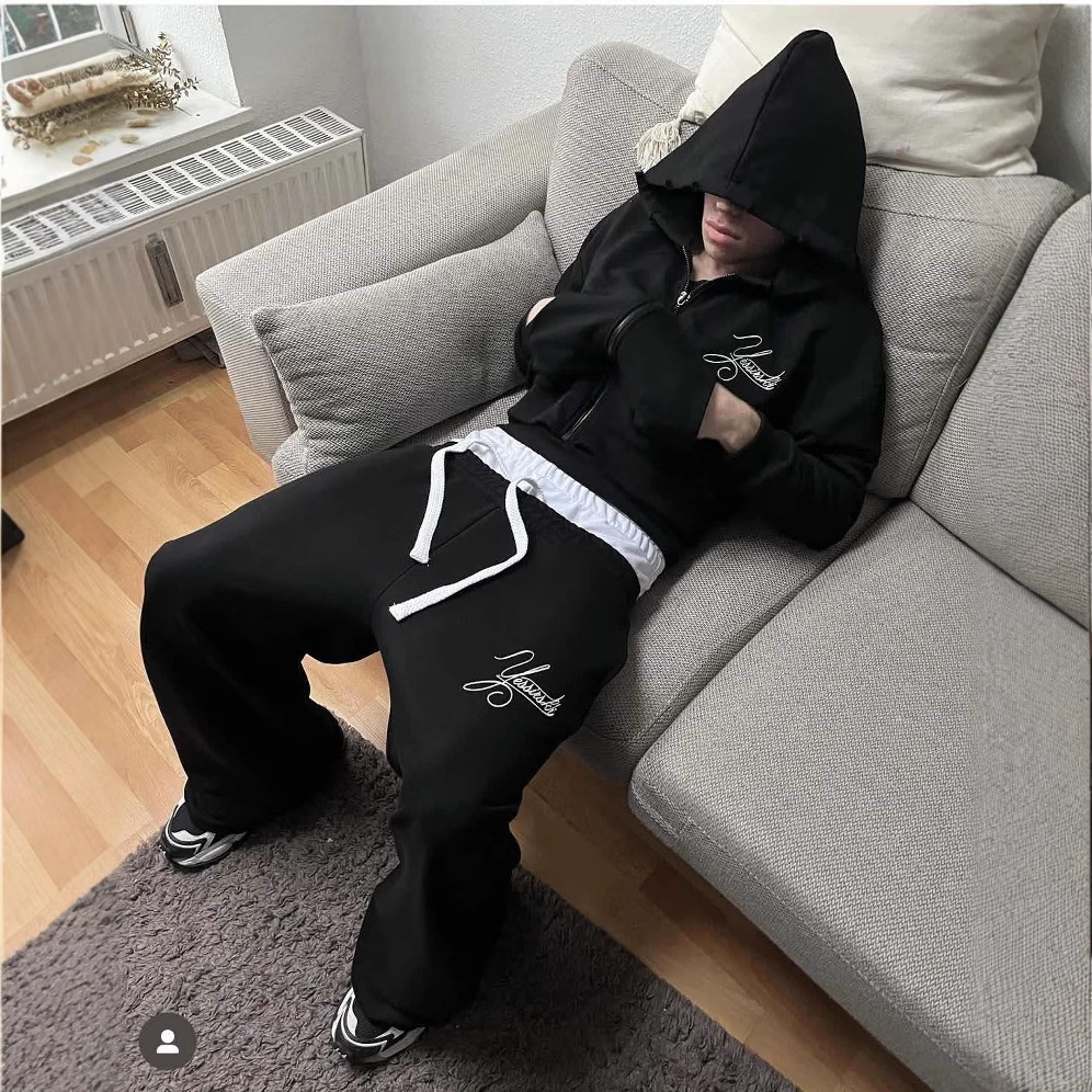 Pantalones deportivos grises de doble cintura para hombre, estilo hip-hop, holgados, de pierna ancha, informales, de talle alto y ajuste holgado.