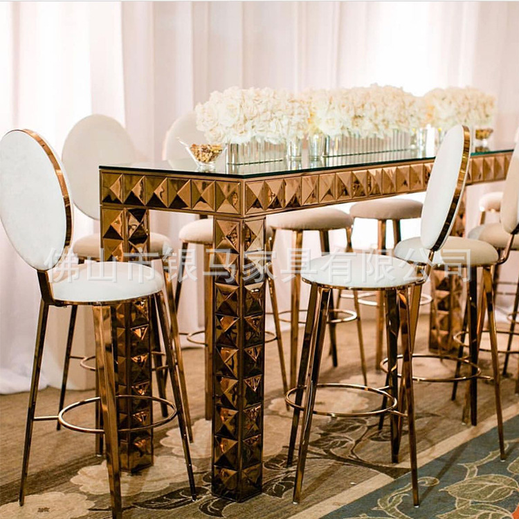 Fábrica al por mayor Hotel banquete boda comedor silla boda galvanoplastia Silla de acero inoxidable Bolsa De Oro suave Silla de comedor de cuero