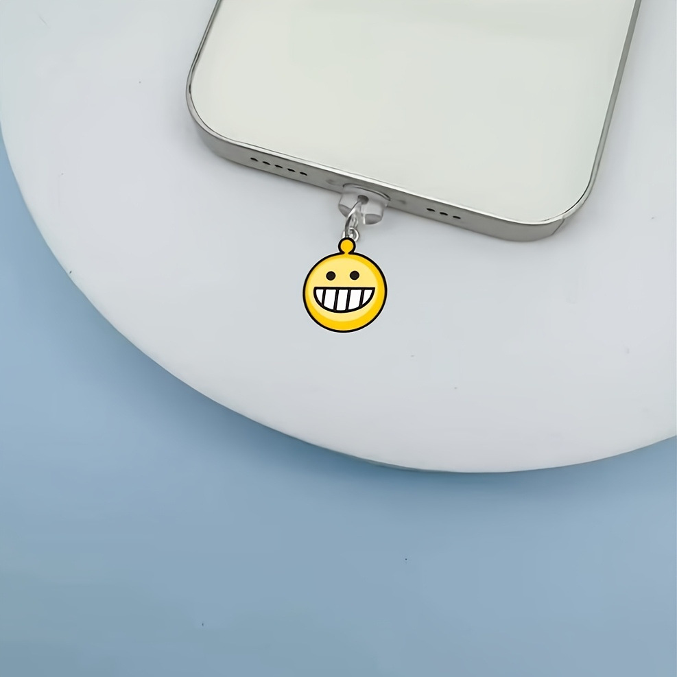 Nuevo acrílico transfronterizo plano hacia la sonrisa bolsa de emoticones enchufe de polvo de teléfono móvil