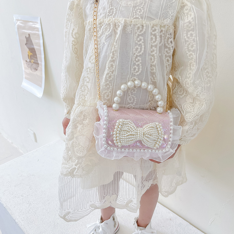 Bolso bandolera de moda de un solo hombro nuevo estilo niña estilo occidental perla portátil mini lindo bolso de perlas de un solo hombro